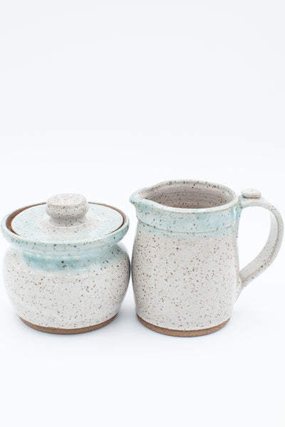 Sugar and Cream set in speckled clay with Spiced Cream and Teal glaze