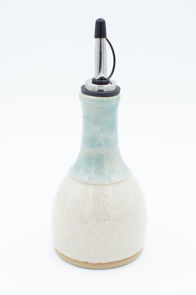 Oil bottle in spiced cream and teal glaze