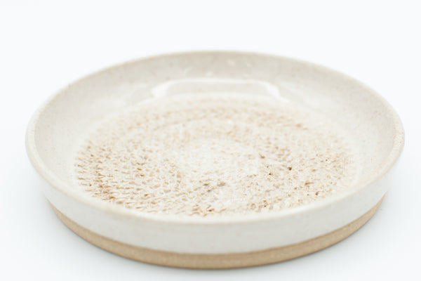 Garlic grater in spiced cream glaze