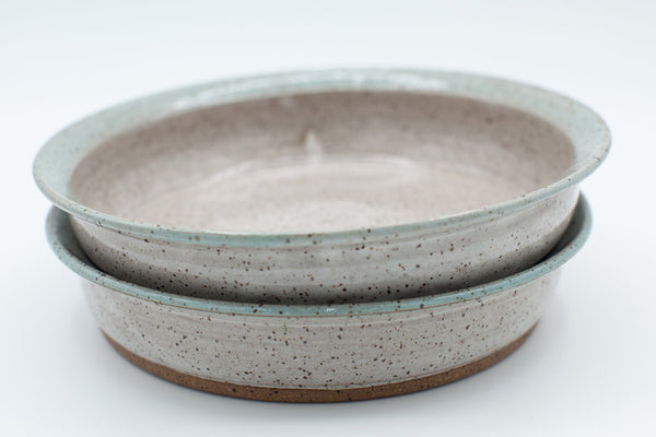 Pasta bowl in speckled clay with Spiced cream and Teal glaze