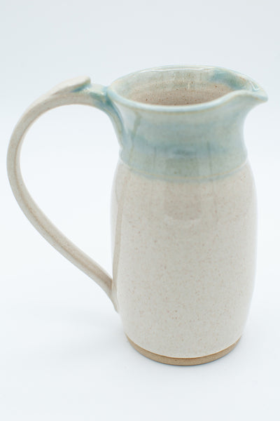 Pitcher in spiced cream and teal glaze