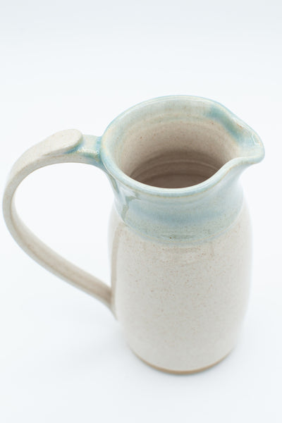 Pitcher in spiced cream and teal glaze