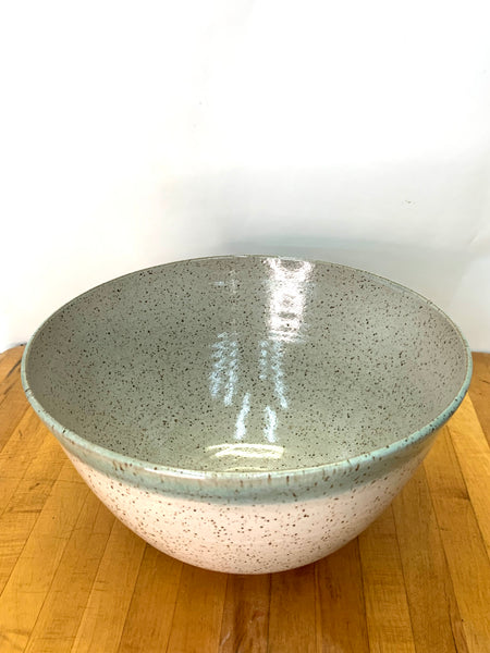Serving bowl in speckled clay with spiced cream and teal glaze