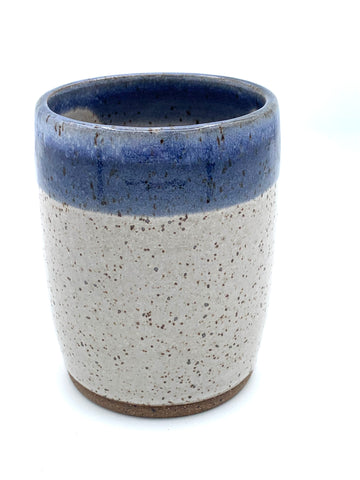 Tumbler in speckled clay with Spiced cream and Blue glaze