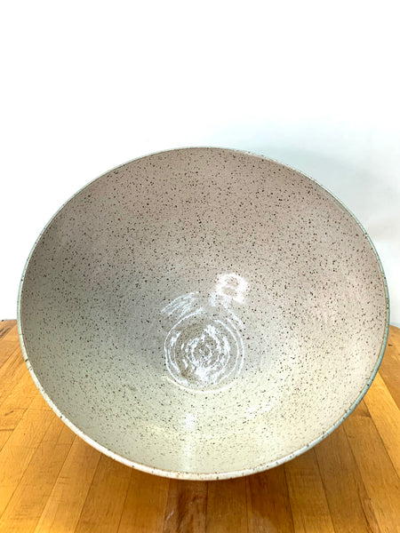 Serving bowl in speckled clay with spiced cream and teal glaze