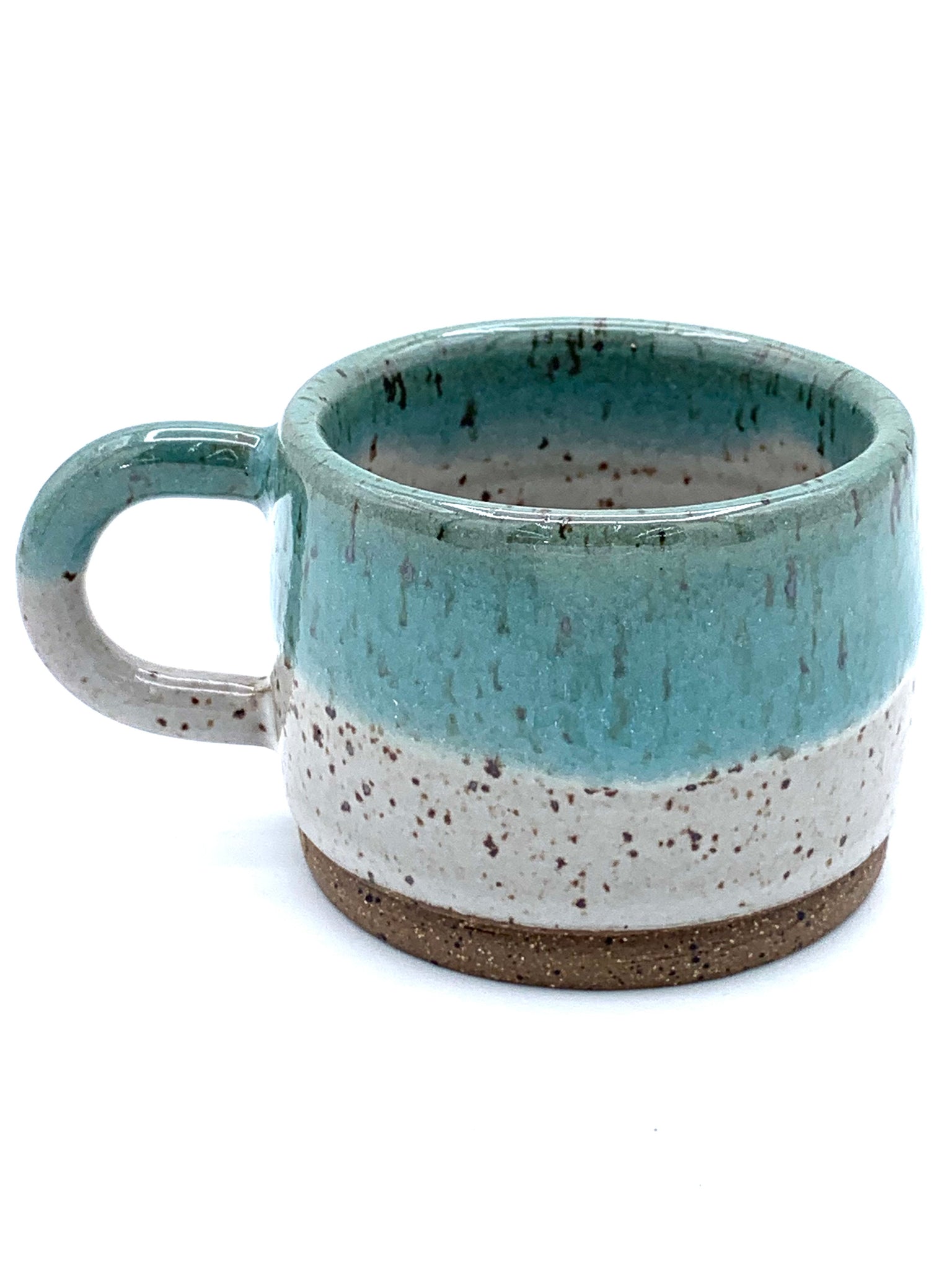 Espresso cup in speckled clay with Spiced cream and Teal glaze