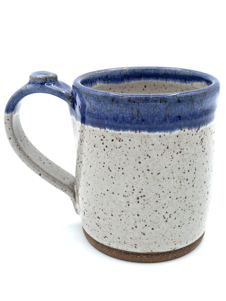 Mug in speckled clay with Aspen White and Blue glaze