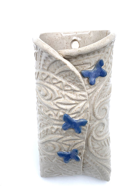 Wall pocket in cream with blue butterflies