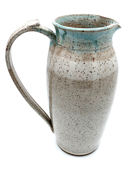 Pitcher in speckled clay with Spiced cream and teal glaze