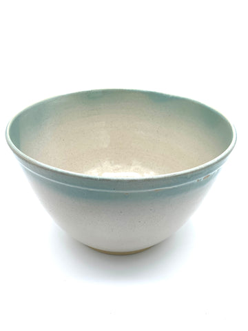 Bowl in spiced cream and teal glaze