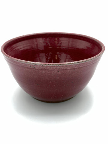 Bowl in speckled clay with Raspberry glaze