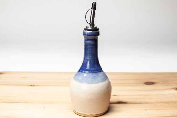 Oil bottle in spiced cream and blue glaze