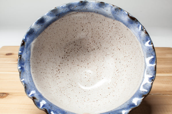 Bowl in Spiced Cream and Blue glaze with fluted rim