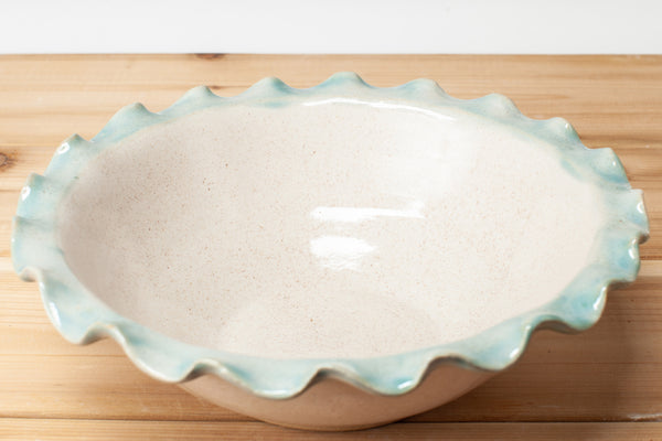 Bowl with fluted rim in Spiced Cream and Teal glaze