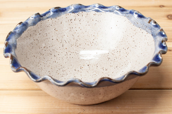 Bowl in Spiced Cream and Blue glaze with fluted rim