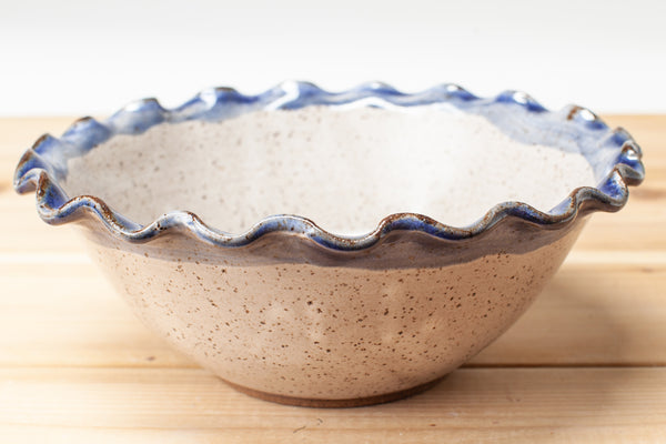 Bowl in Spiced Cream and Blue glaze with fluted rim