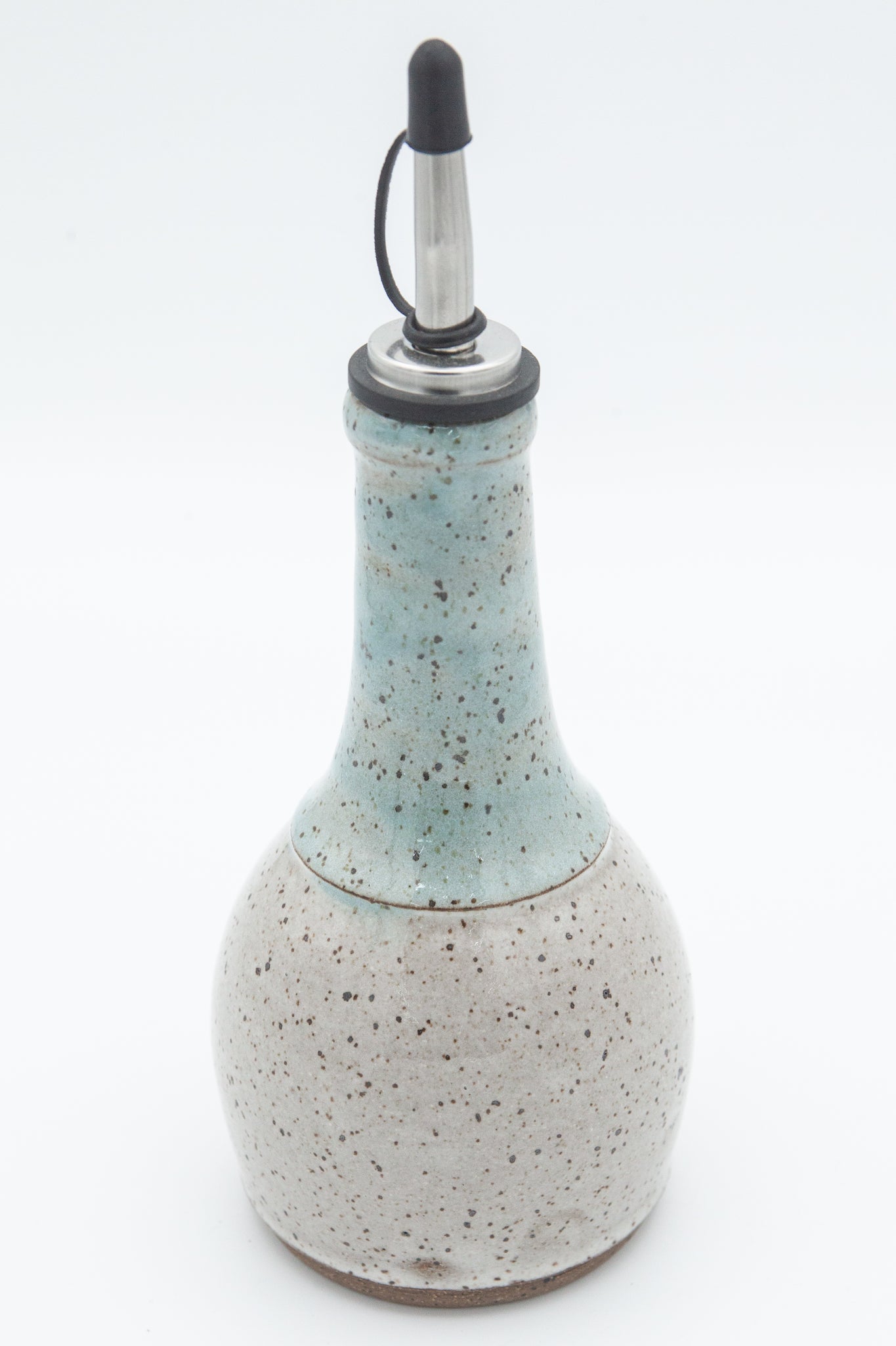 Oil Bottle in speckled clay with Spiced Cream and Teal glaze