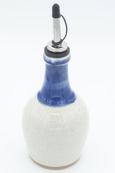 Oil bottle in spiced cream and blue glaze