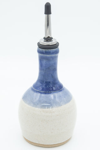 Oil bottle in spiced cream and blue glaze