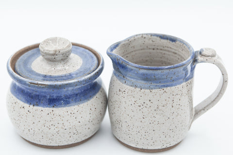 Sugar and Cream set in speckled clay with Cream and Blue glaze