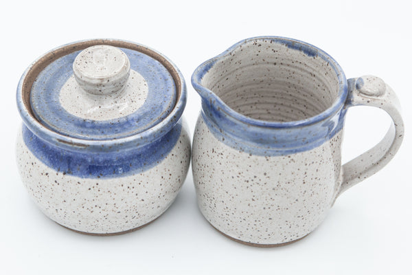 Sugar and Cream set in speckled clay with Cream and Blue glaze