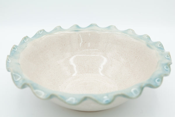 Bowl with fluted rim in Spiced Cream and Teal glaze