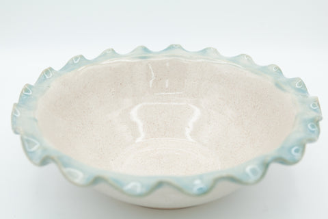 Bowl with fluted rim in Spiced Cream and Teal glaze