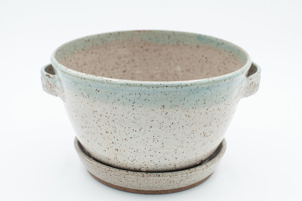 Berry bowl in speckled clay with Spiced Cream and Teal glaze