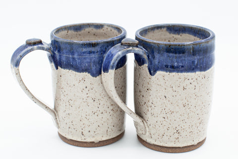 Mug in speckled clay with Spiced Cream and Blue glaze