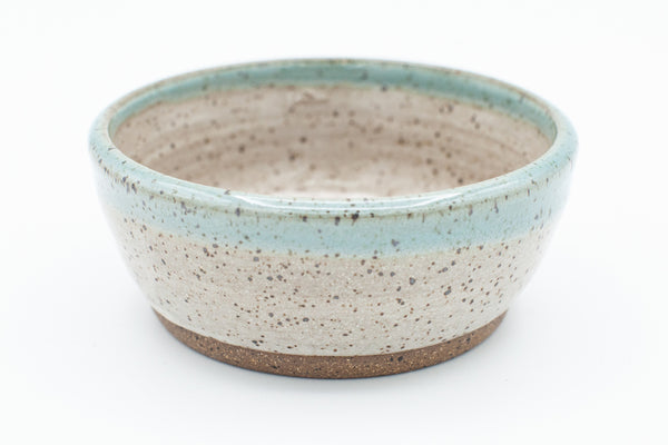 Condiment bowl in speckled clay with Spiced Cream and Teal glaze