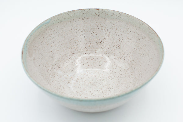 Bowl in speckled clay with Aspen White and Teal glaze