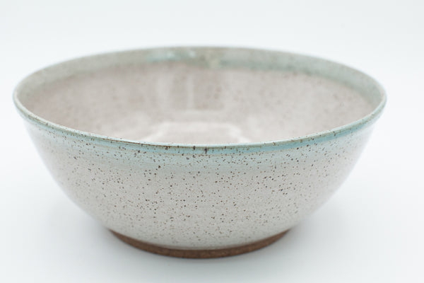 Bowl in speckled clay with Aspen White and Teal glaze