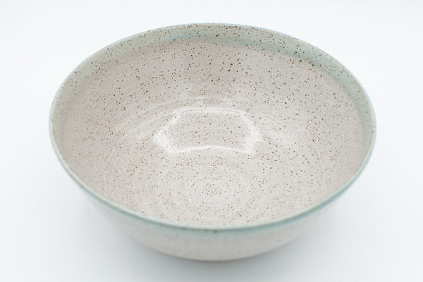 Bowl in speckled clay with Aspen White and Teal glaze