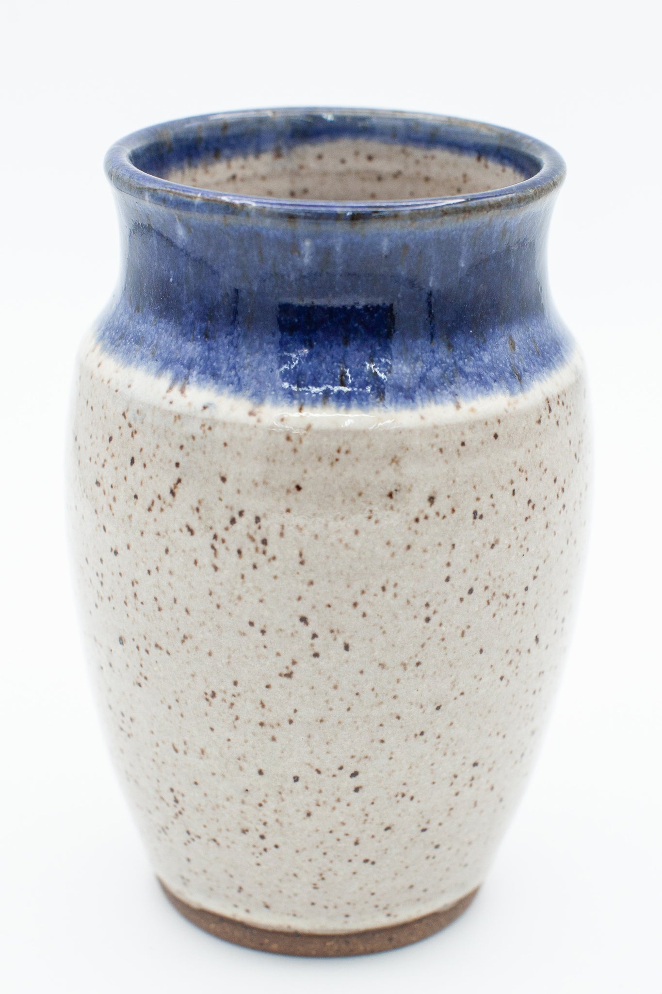 Vase in speckled clay with Spiced Cream and Blue glaze