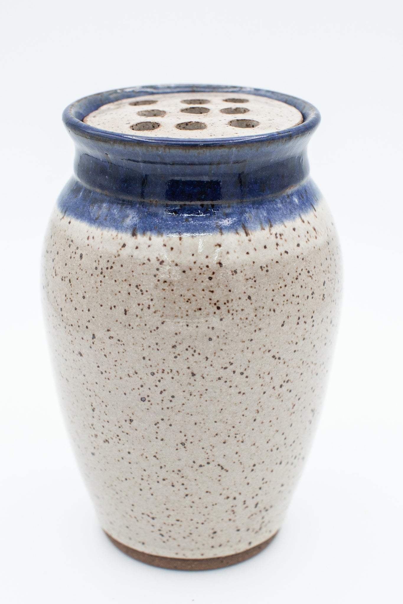 Vase with flower frog in speckled clay with Spiced Cream and Blue glaze