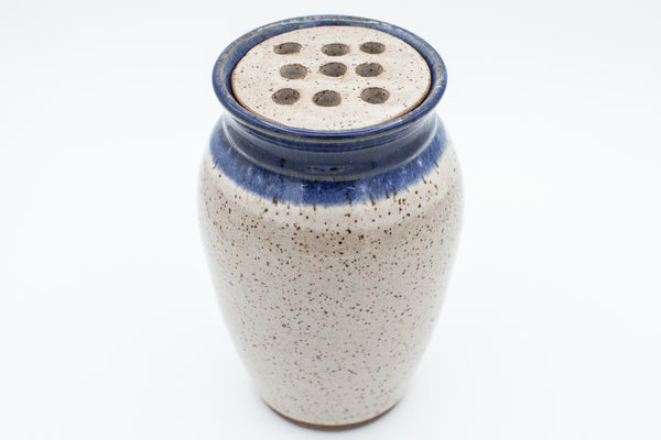 Vase with flower frog in speckled clay with Spiced Cream and Blue glaze