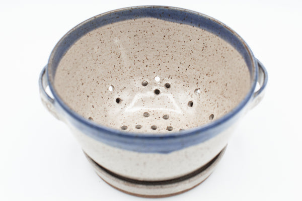 Berry bowl in speckled clay with Spiced Cream and Blue glaze