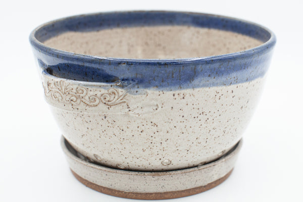 Berry bowl in speckled clay with Spiced Cream and Blue glaze