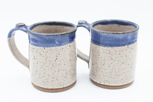 Mug in speckled clay with Spiced Cream and Blue glaze