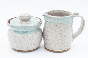 Sugar and Cream set in speckled clay with Spiced Cream and Teal glaze