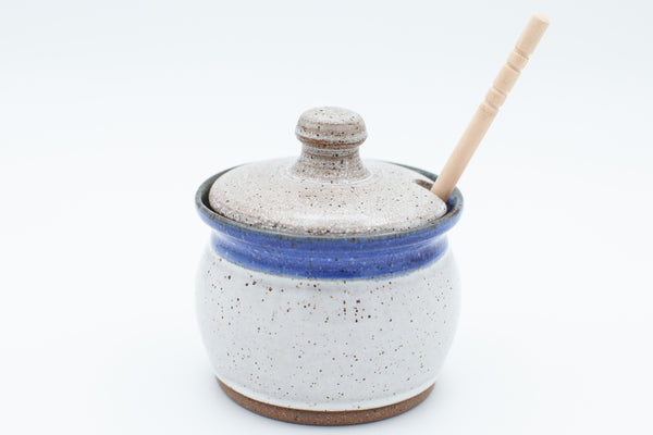 Honey jar in speckled clay with Aspen white and blue glaze