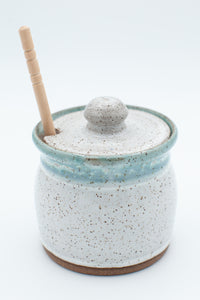 Honey jar in speckled clay with Aspen white and teal glaze