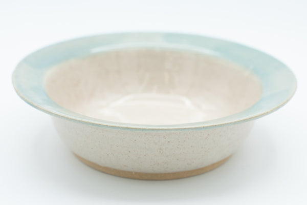 Bowl in spiced cream and teal glaze