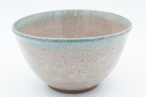 Serving bowl in speckled clay with spiced cream and teal glaze