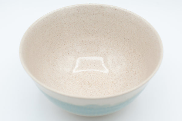 Serving bowl with spiced cream and teal glaze