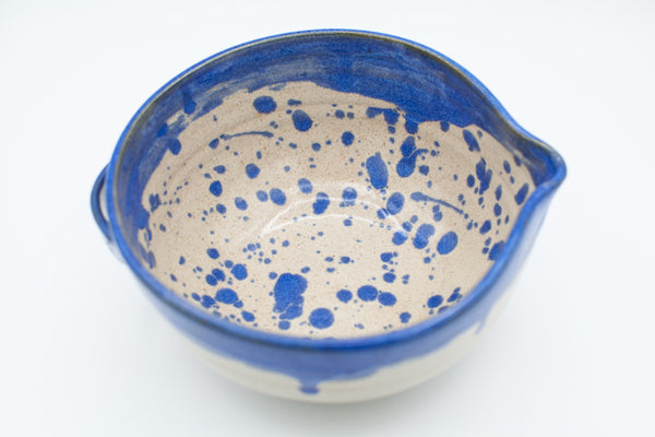 Batter bowl in spiced cream and blue glaze and splatter