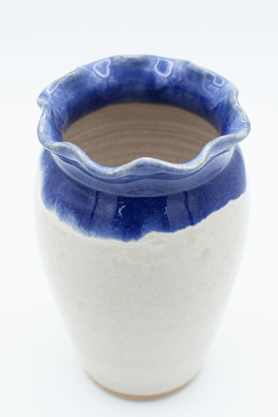 Vase with fluted rim and flower frog in spiced cream and blue glaze