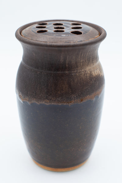 Vase with flower frog in persimmon and tan glaze