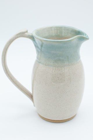 Pitcher in spiced cream and teal glaze