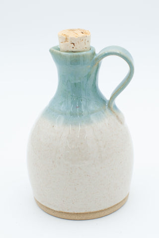 Oil bottle with cork and teal and spiced cream glaze